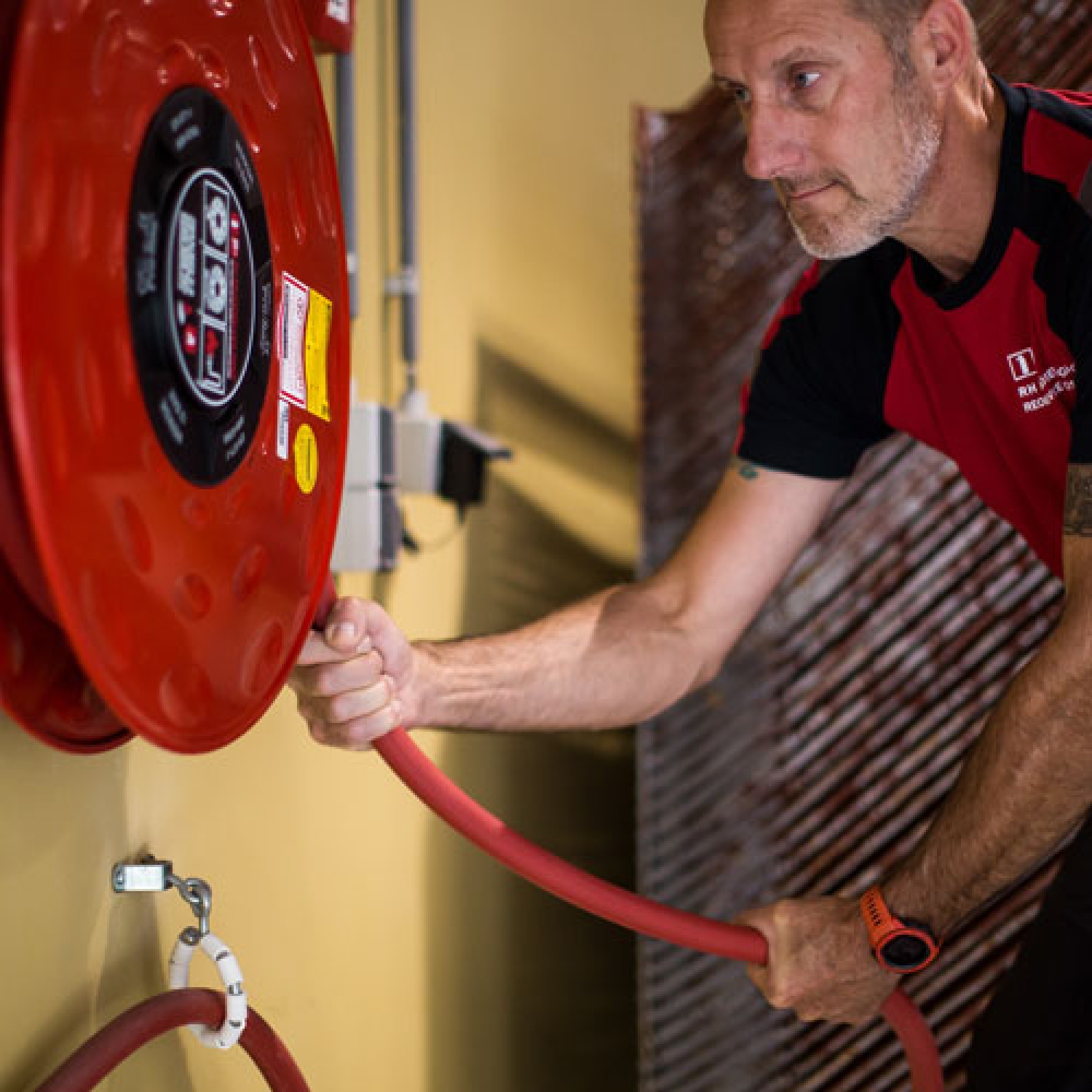 Afpersen brandslanghaspel